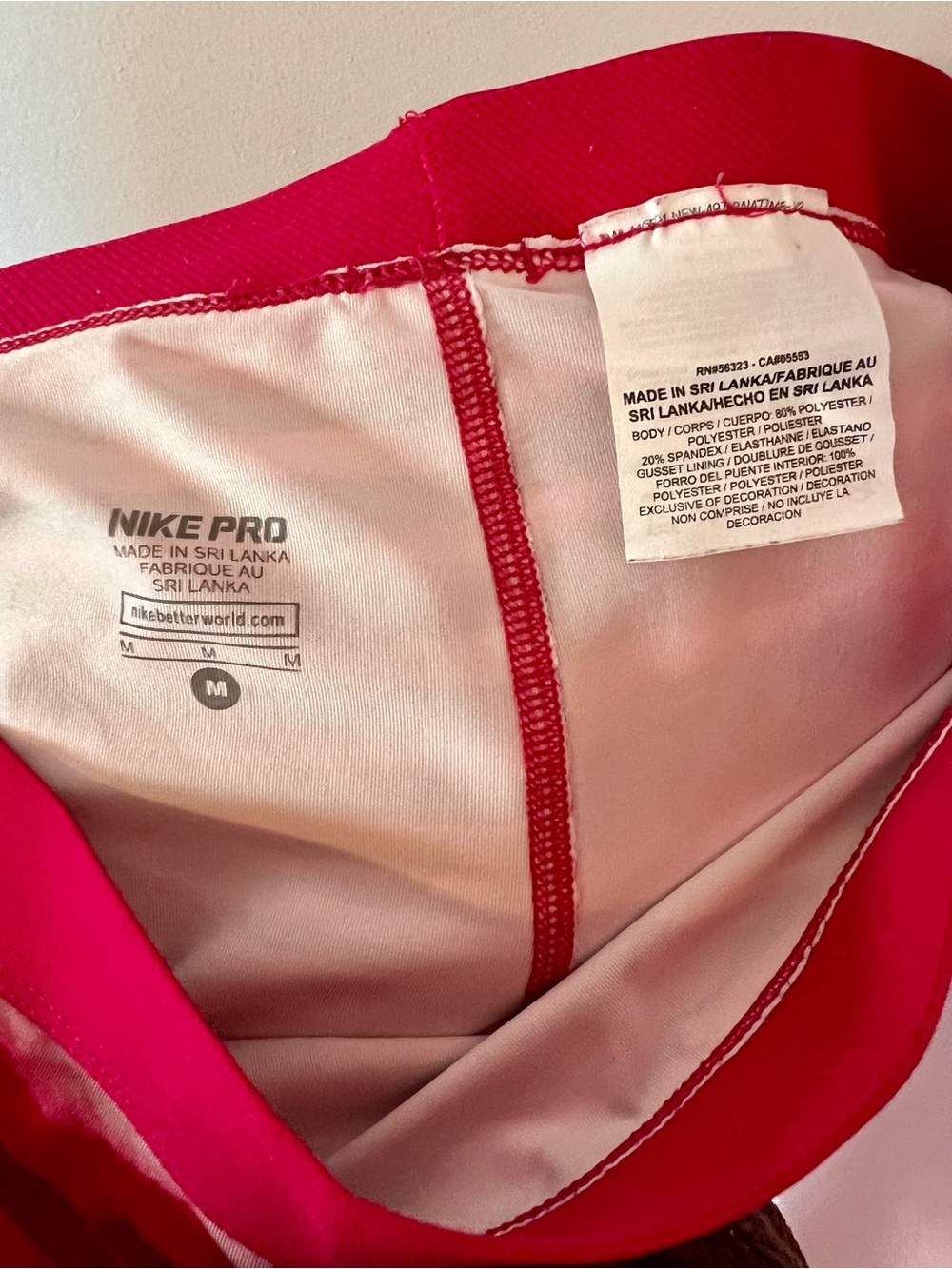 Nike Pink and Red Striped Women’s Capri Leggings - Picture 4 of 4